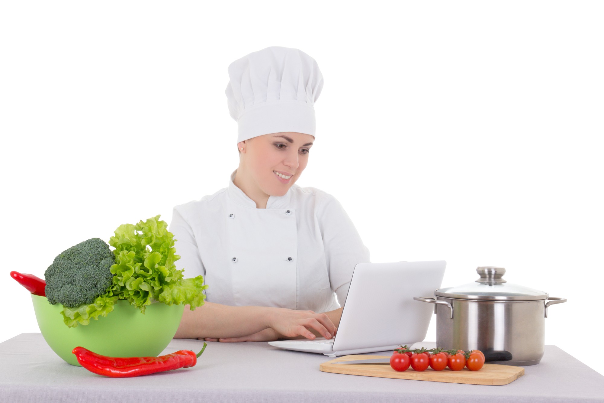 Chef che insegna online con laptop